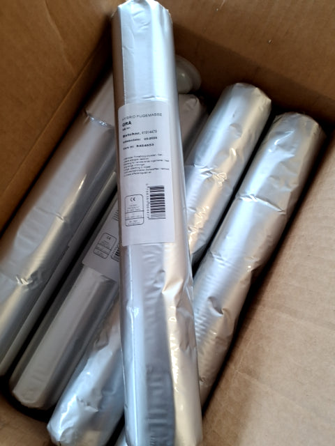 Grå fugemasse pr. Pose 5 kr.